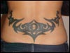 steissbein tribal tatoo